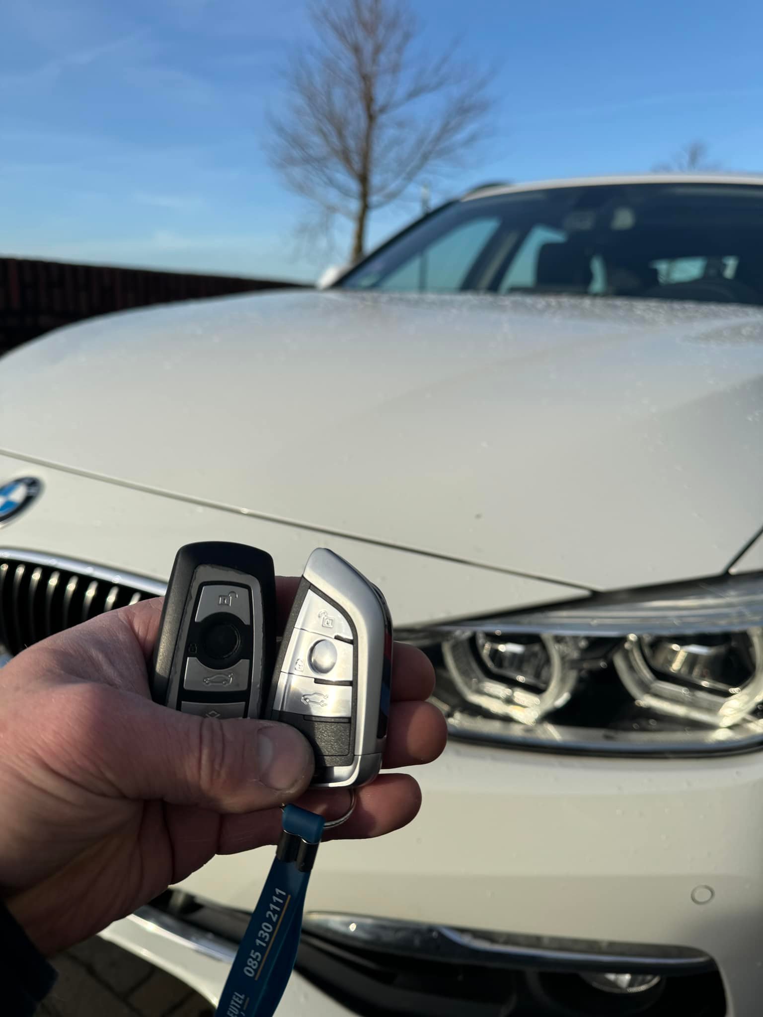 Replacement BMW car keys provided by a professional automotive locksmith.
